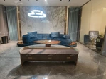 Luxury Teal Velvet Curved Sectional Sofa with Natural Wood Veneer Base & Branded Cushions